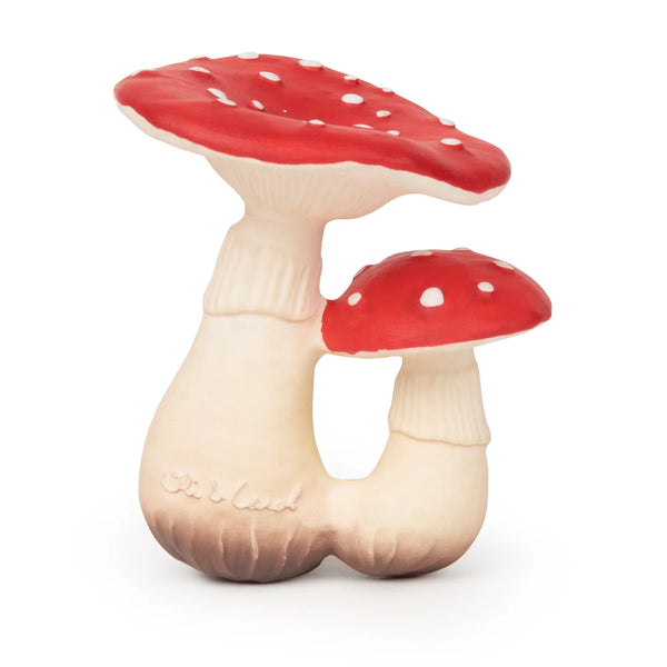 two mushrooms with red polka dot top