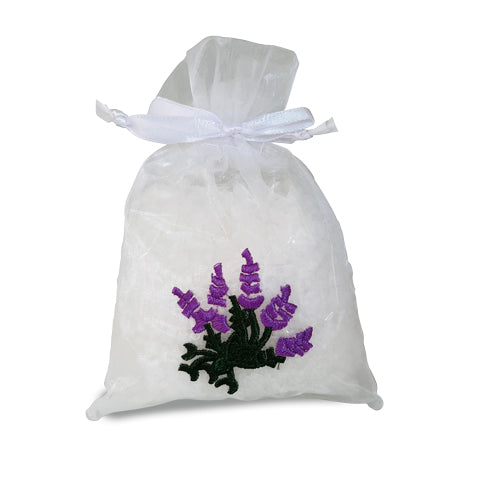 Pouch of lavender bath salt in an embroidered bag
