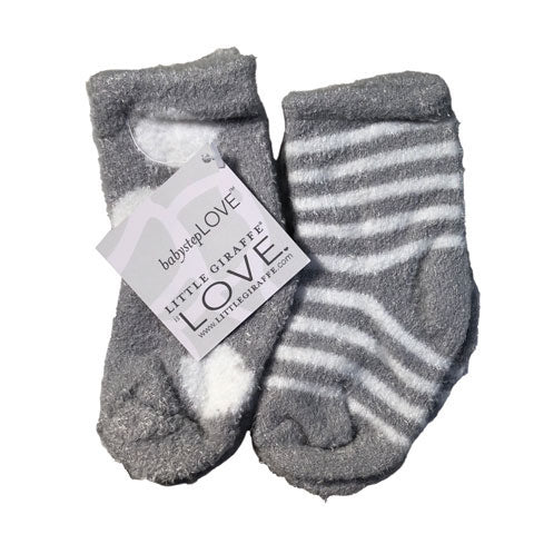 Super soft baby socks, one gray with white stripes and one gray and white dots