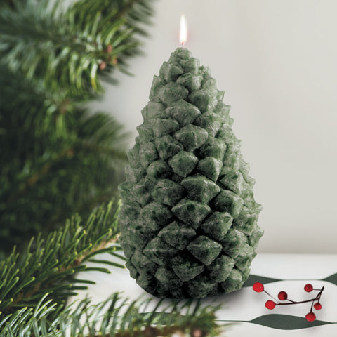 green pine cone candle