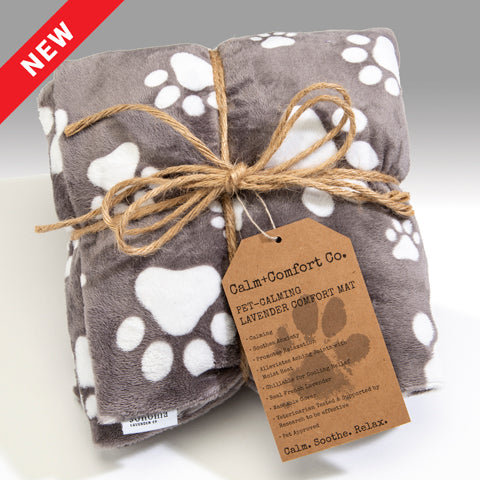 Brown blanket with white paw prints. Pet calming blanket pad. Sonoma Lavender
